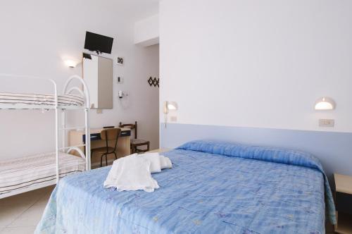 Postel nebo postele na pokoji v ubytování Hotel Edelweiss