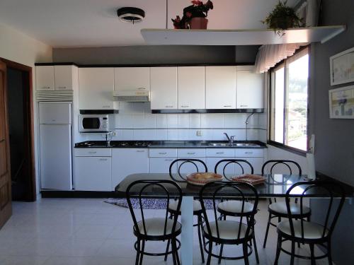 Kuchyňa alebo kuchynka v ubytovaní Apartamentos Blanco