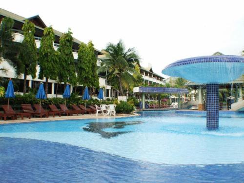 a large swimming pool in a resort at Grand Jomtien Palace Hotel - SHA Extra Plus in Jomtien Beach