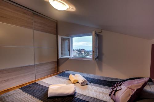 Apartman NANEにあるベッド