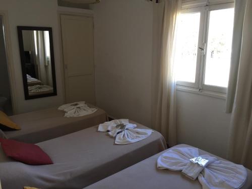 Katil atau katil-katil dalam bilik di Luna Serrana Hotel