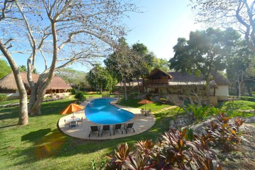 Piscina en o cerca de The Lodge at Chichen Itza
