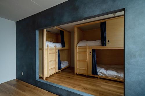 Postel nebo postele na pokoji v ubytování EN hostel