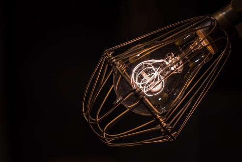 a close up of a glass container with a wire at Enoca Hotel in Fujisawa