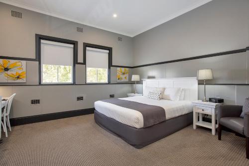 CH Boutique Hotel & Apartments, an Ascend Collection Hotelにあるベッド