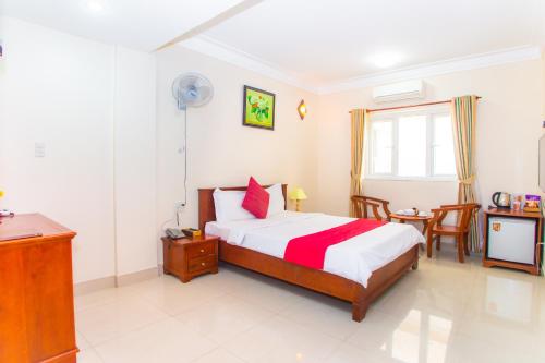 Katil atau katil-katil dalam bilik di Dong Do Hotel
