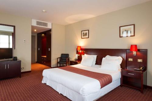 Hotel Restaurant Weinebruggeにあるベッド