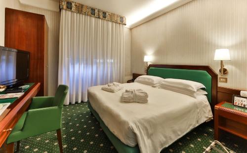 Postel nebo postele na pokoji v ubytování Hotel Astoria Sure Hotel Collection By Best Western