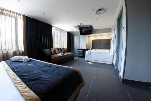Postel nebo postele na pokoji v ubytování Best Western JFK Hotel