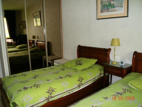 Cama o camas de una habitación en Chambre d'hôtes - Garibaldi