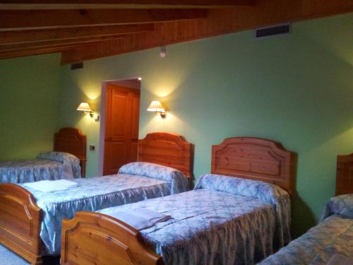 Katil atau katil-katil dalam bilik di Hostal Casa Ramón