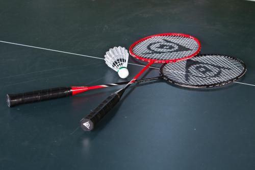 two tennis rackets sitting on top of a table at Sun 'n Chill, Boutique Apartments & Beach Villa in Melíkia