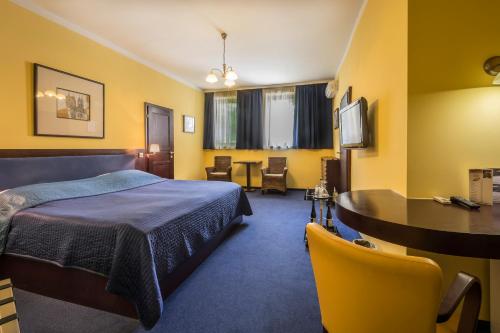 Una cama o camas en una habitación de Hotel Arte