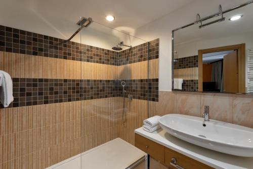 Ett badrum på Hotel Motel Futura