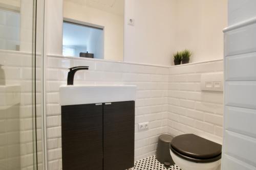 Koupelna v ubytování Luxury Apartment by Hi5 - Régiposta