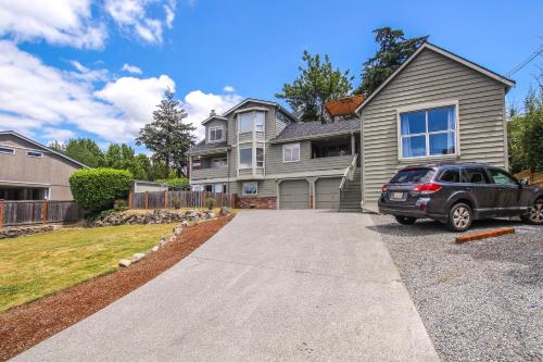 a car parked in front of a house at Blue Angels Room Mercer Island in Mercer Island