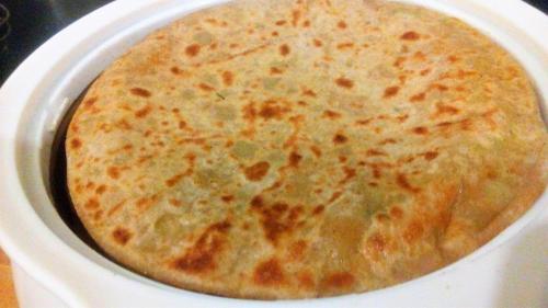 a close up of a pie in a white container at Vamoose Soshing Homestay in Ravangla