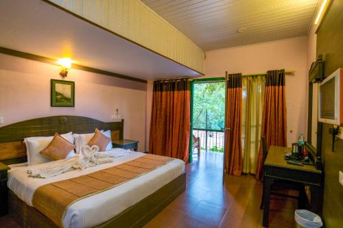 Postel nebo postele na pokoji v ubytování Upavan Resort