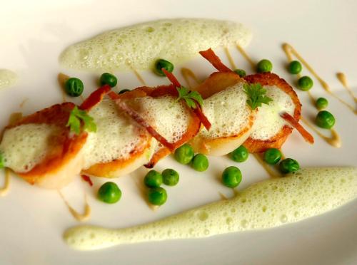 two sandwiches with peas on a white plate at St Elizabeth's House in Plymouth