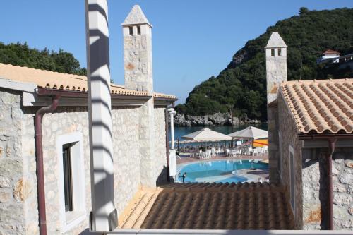 a view of the pool from the building at Anemolia Parga Suites in Sarakiniko
