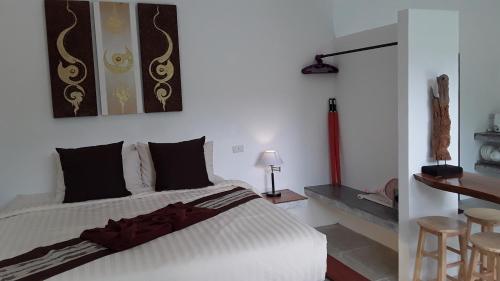 Voodi või voodid majutusasutuse The Great Escape Chalets toas