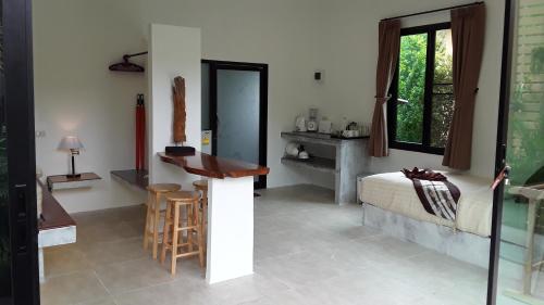 Voodi või voodid majutusasutuse The Great Escape Chalets toas