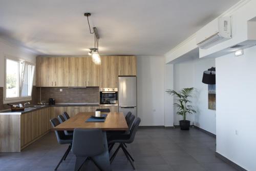 Ett kök eller pentry på Blue4Aqua Apartments