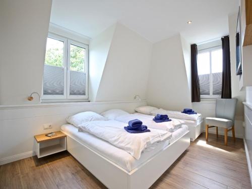Postel nebo postele na pokoji v ubytování Blanker Hans Wohnung 5