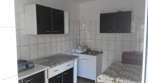 Kuchyň nebo kuchyňský kout v ubytování vila CALIL