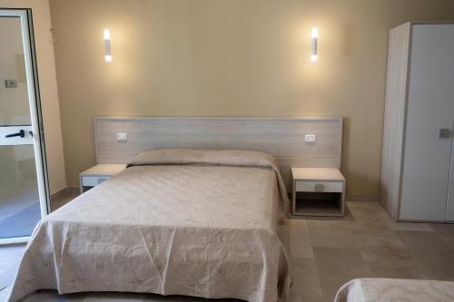 Cama o camas de una habitación en B&B Villa Lisa