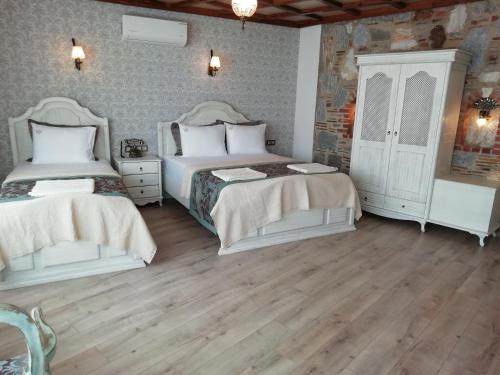 Celsus Boutique Hotelにあるベッド