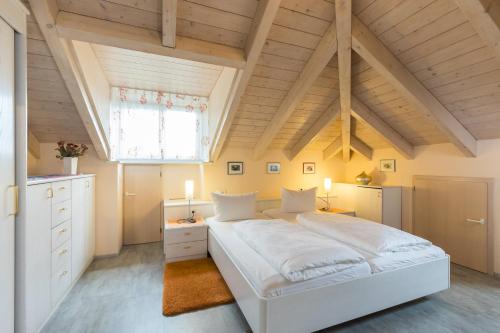 מיטה או מיטות בחדר ב-Gästehaus Anita