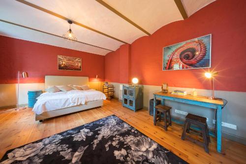 Una cama o camas en una habitación de Design Apartments - "Im Holländerhaus"