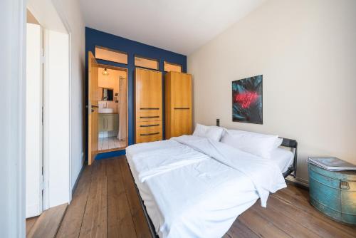 Una cama o camas en una habitación de Design Apartments - "Im Holländerhaus"