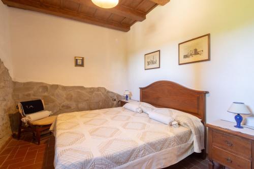 Postel nebo postele na pokoji v ubytování Casale Mazzini by VacaVilla