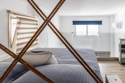a room with a hammock bed in a bedroom at Exandas in Ierapetra