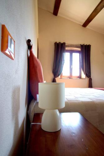 Ένα ή περισσότερα κρεβάτια σε δωμάτιο στο B&B Bagnarello73