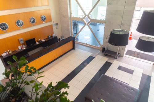 El vestíbulo o la zona de recepción de Iguatemi Business & Flat by Avectur