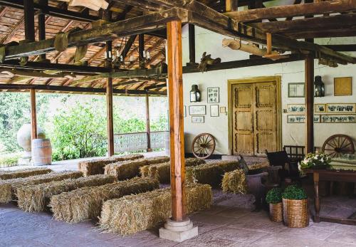 a room filled with bales of hay in a building at Hotel Hacienda los Lingues in Los Lingues