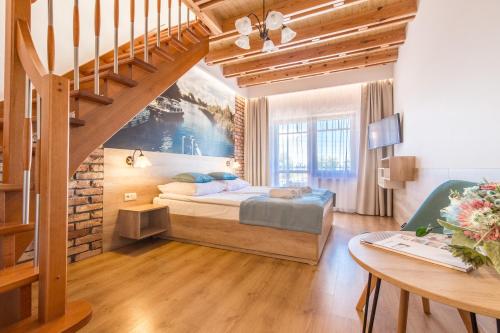 Llit o llits en una habitació de Słoneczny Dwór