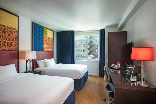 Postel nebo postele na pokoji v ubytování Hotel Hayden New York