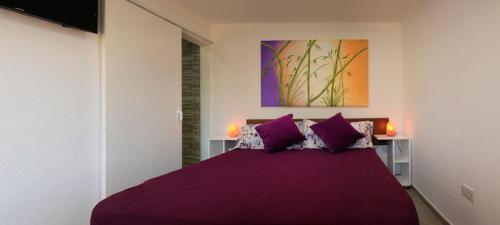 Una cama o camas en una habitación de Espacio Zen Deros