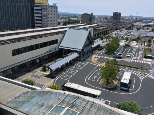 an aerial view of a bus station in a city at Twin Leaves Hotel Izumo in Izumo