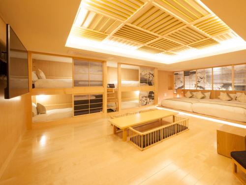 a living room with a couch and a table at The Centurion Classic Akasaka in Tokyo