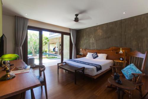 Ένα ή περισσότερα κρεβάτια σε δωμάτιο στο Ocean Breeze Villa