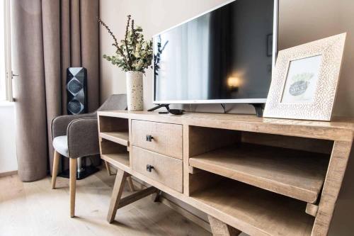 TV a/nebo společenská místnost v ubytování Best Place and Comfort Apartments