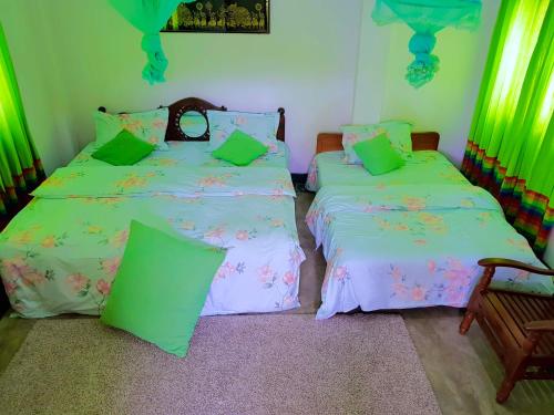 Säng eller sängar i ett rum på Leisure Villa