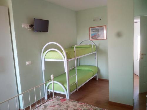 Postel nebo postele na pokoji v ubytování Via col Vento