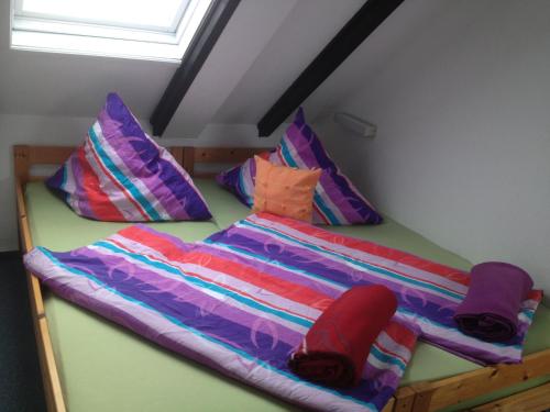 Un pat sau paturi într-o cameră la Haus Nordlicht