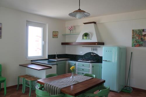 Kuchyň nebo kuchyňský kout v ubytování Bio Agriturismo Mare in Campagna